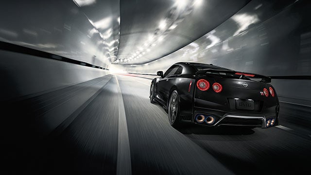 2023 Nissan GT-R seen from behind driving through a tunnel | Andy Mohr Avon Nissan in Avon IN